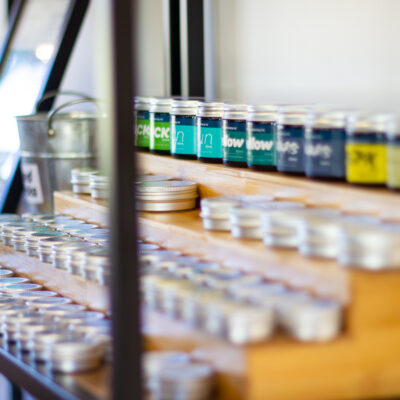 Treebrush Apothecary kawakawa balms on a retail shelf